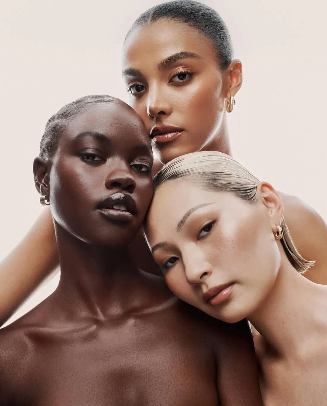 Two models in a tender embrace